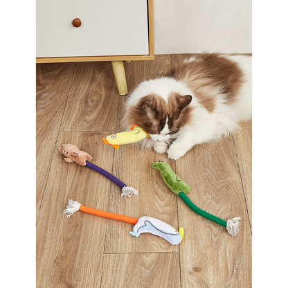 Cat resting beside four animal-character toys with wrapped stems