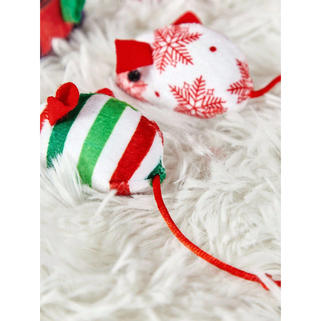 Close-up of striped and snowflake mouse-shaped cat toy patterns