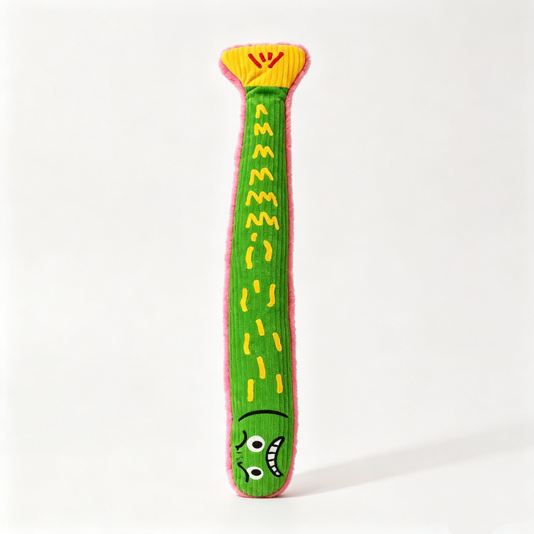 Green fish-shaped cat toy with yellow markings and cartoon face