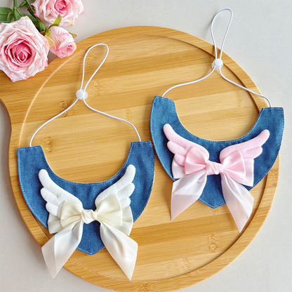 Pink and ivory angel-wing cat neckwear styles displayed together