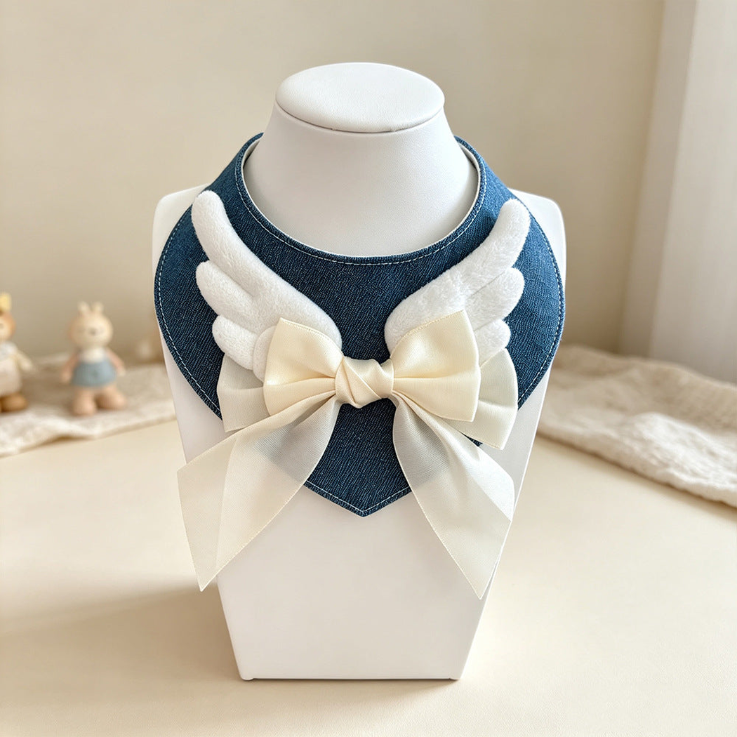 Blue cat neckwear with ivory angel wings and bow, front display
