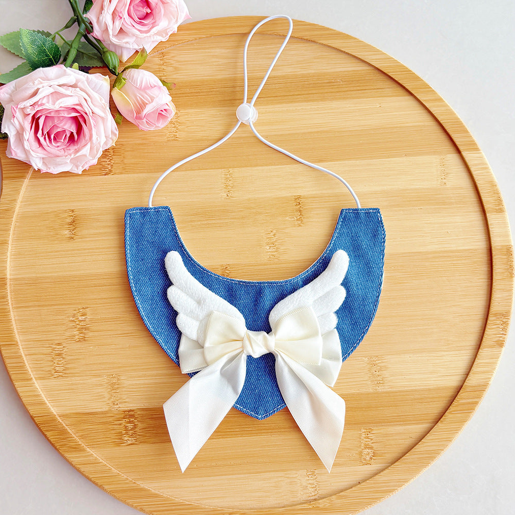 Ivory angel-wing cat neckwear with bow and adjustable cord