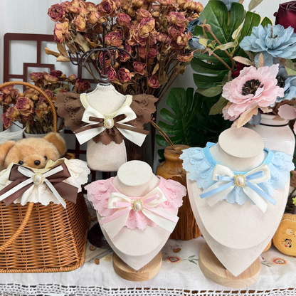 Brown, Ivory, Light Pink, and Light Blue decorative pet neckwear displayed together