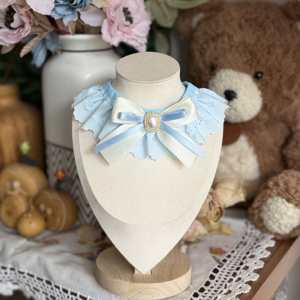 Light Blue decorative pet neckwear with layered scalloped ruffles and an ivory ribbon bow