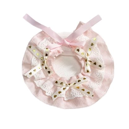 Pink checked pet neckwear with layered lace-look ruffles and heart-print bows, front view