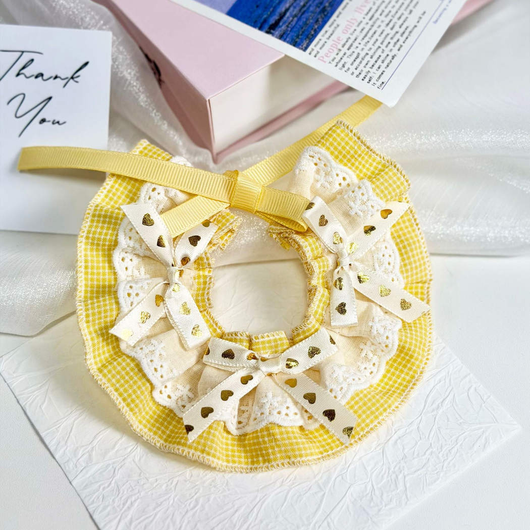 Yellow checked pet neckwear with lace-look ruffles and heart-print bows