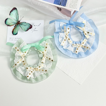 Mint and light blue pet neckwear displayed together