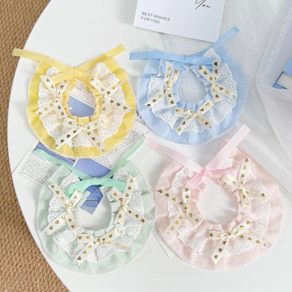 Yellow, light blue, mint and pink pet neckwear displayed together