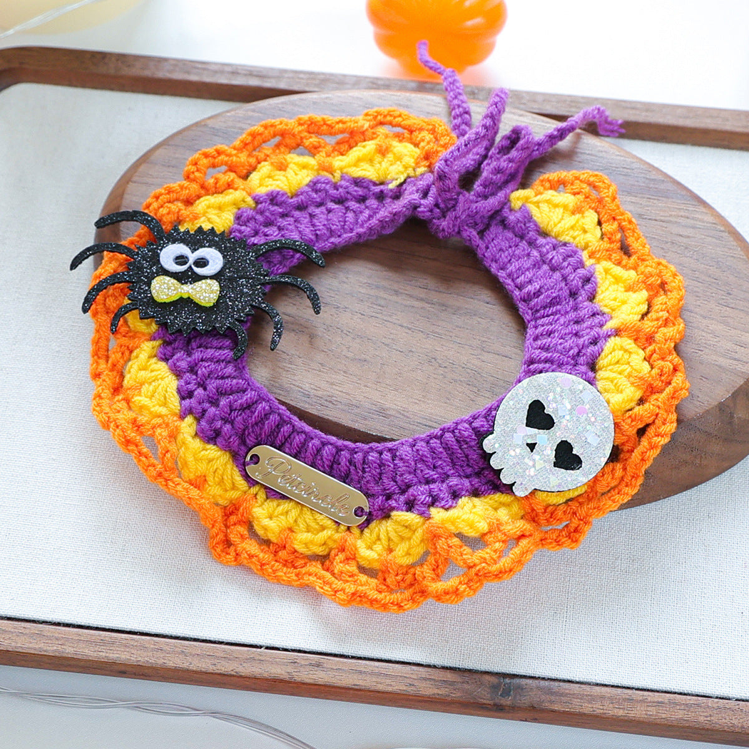 Spider Skull cat neckwear with purple center, orange scalloped edge and tie cords