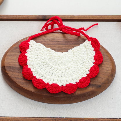 Back view of Green Tree pet neckwear with cream textured panel and red scalloped edge