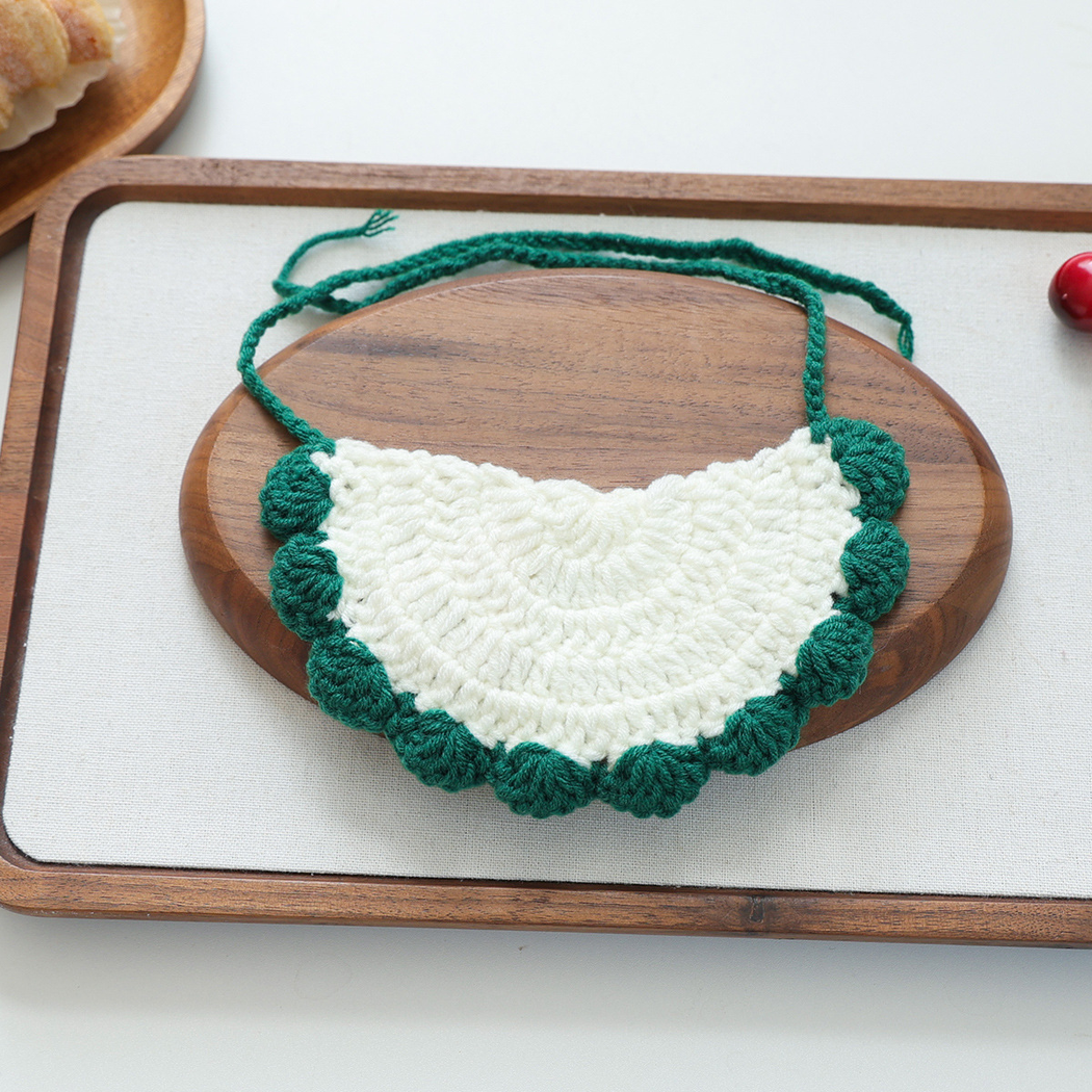 Back view of Red Tree pet neckwear with cream textured panel and green scalloped edge