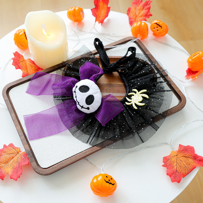 Ghost Spider pet neckwear with purple skull bow and gold-tone spider accent