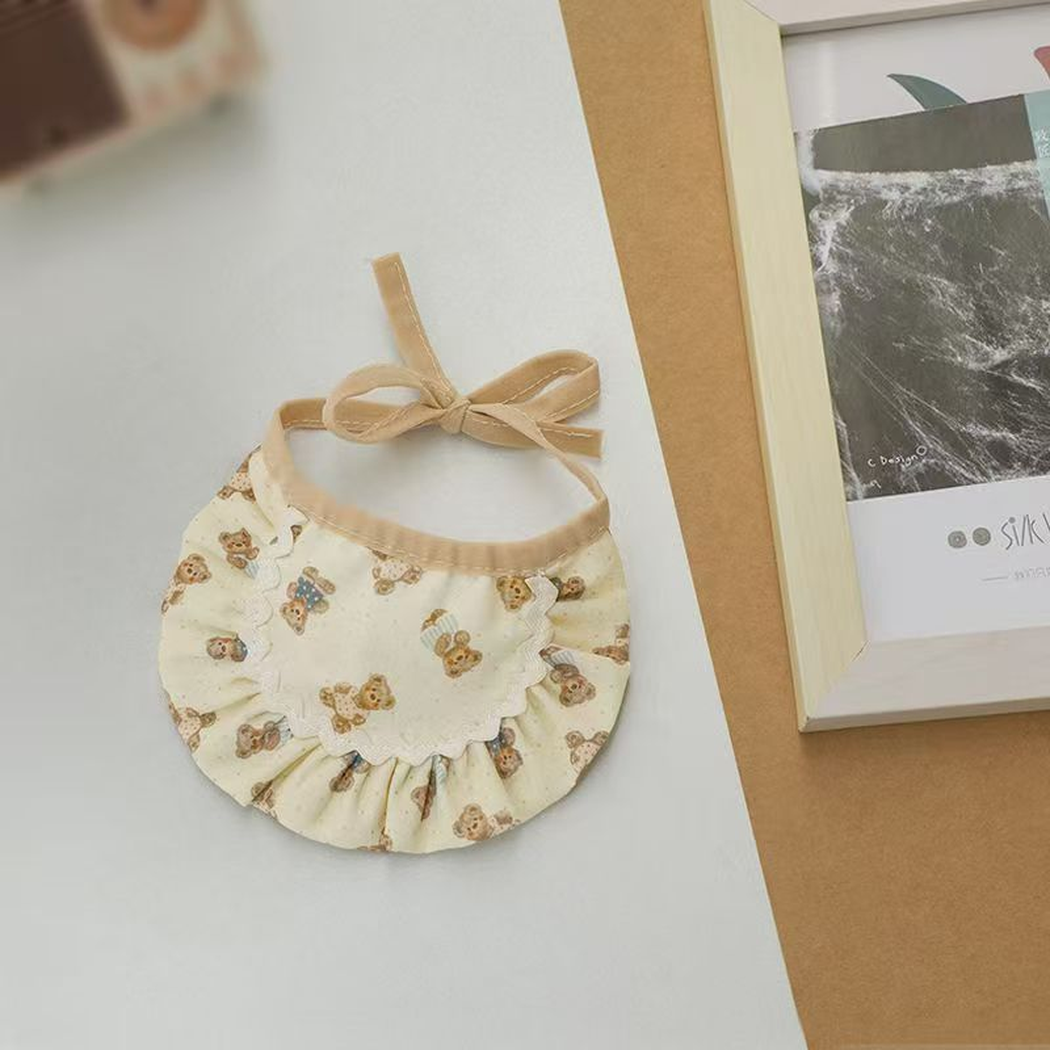 Bear print pet neckwear with beige tie strap fastened in a bow
