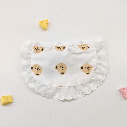 Bear style pet neckwear with repeating tan faces and white ruffle edging