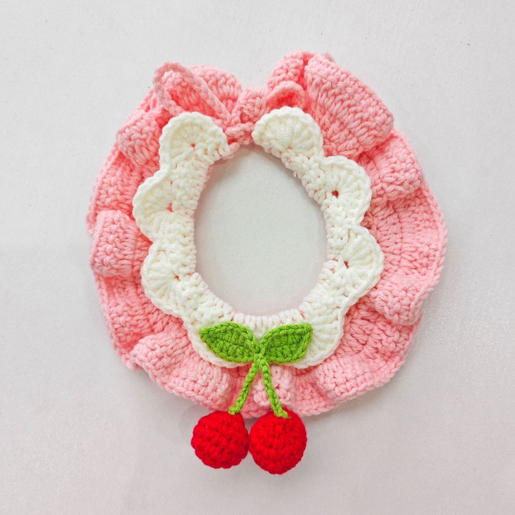 Pink layered pet neckwear with red cherry accents