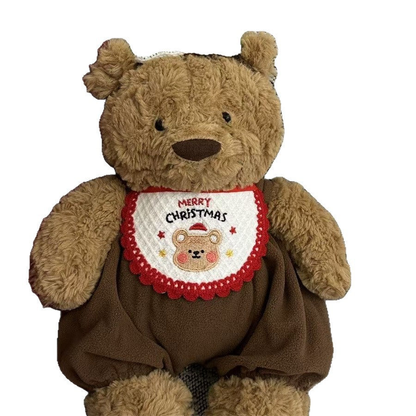 Red and white Christmas bear pet neckwear displayed on a teddy bear figure