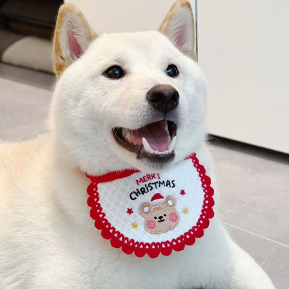 White dog wearing red and white Christmas bear pet neckwear