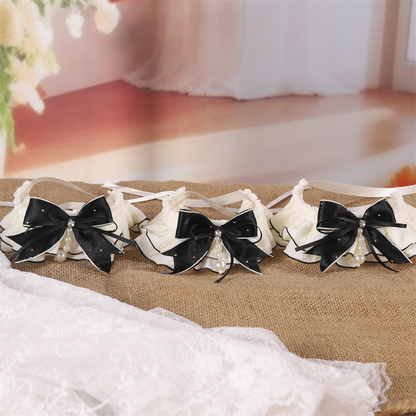 Three ivory ruffled pet neckwear pieces arranged in a wide display