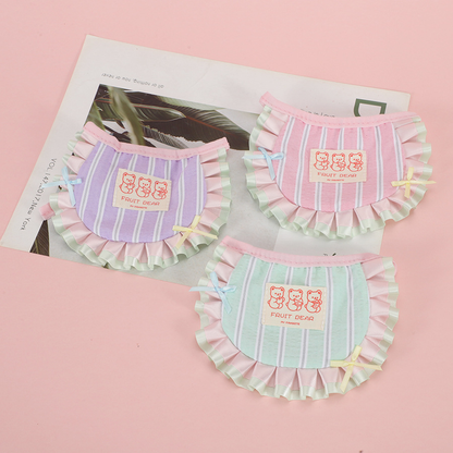 Mint, Light Pink and Light Purple striped pet neckwear arranged on a magazine