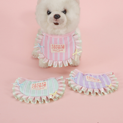 Small white dog wearing Light Pink striped pet neckwear with ruffled trim