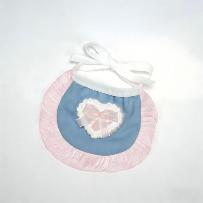 Light Pink pet neckwear with blue bib panel, ruffled trim and heart bow decoration