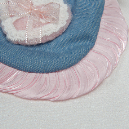 Close-up of the blue bib panel and Light Pink ruffled edge