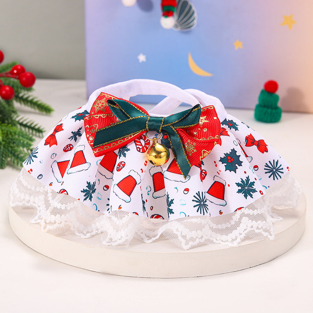 White holiday-print pet neckwear with red and green bow, gold-tone bell and lace-look edge