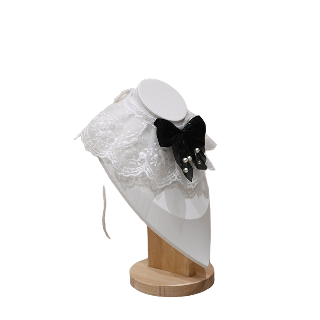 Multicolor pet neckwear with a white lace-look ruff and black bow, right angled view