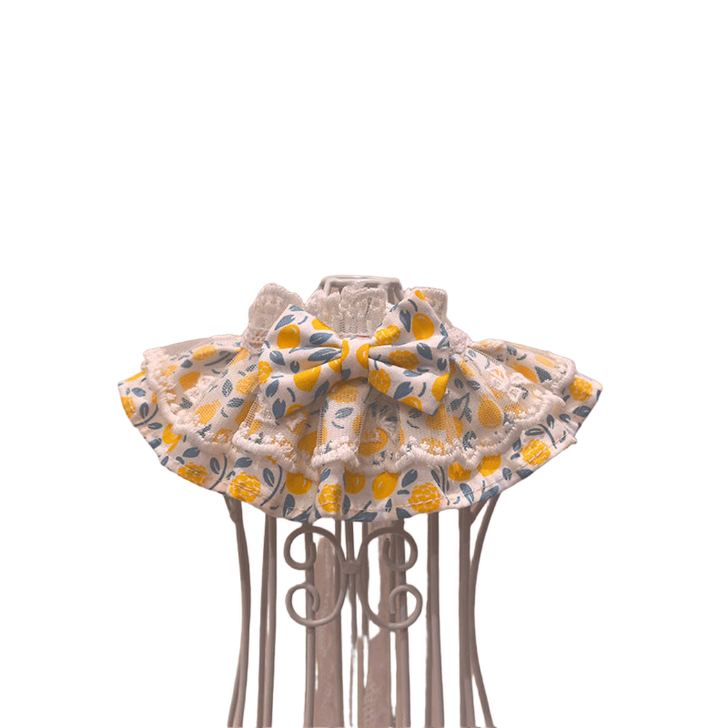 Botanical pet neckwear with layered ruffles and a front bow