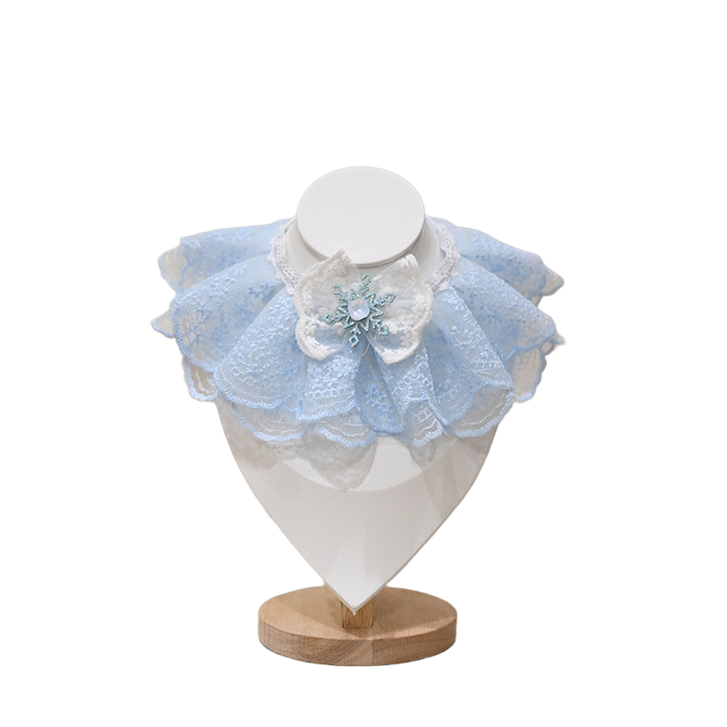 Sky Blue layered pet neckwear with white bow and snowflake-shaped ornament, front view