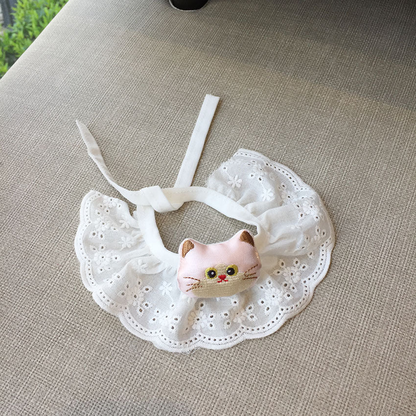 Light Pink cat-face pet neckwear with a white ruffled eyelet-look bib, front view