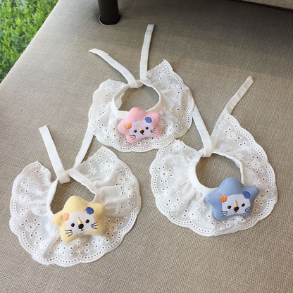 Pink, yellow and light blue ruffled pet neckwear displayed together