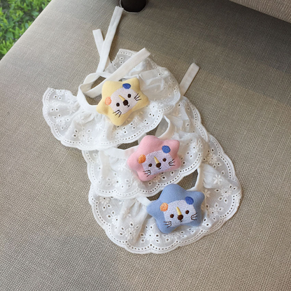 Three color variations of ruffled star-accent pet neckwear in a diagonal arrangement