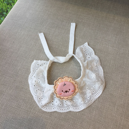 Pink Lion pet neckwear with white floral eyelet ruffle
