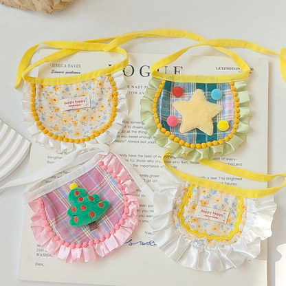 Four ruffled pet neckwear styles arranged together