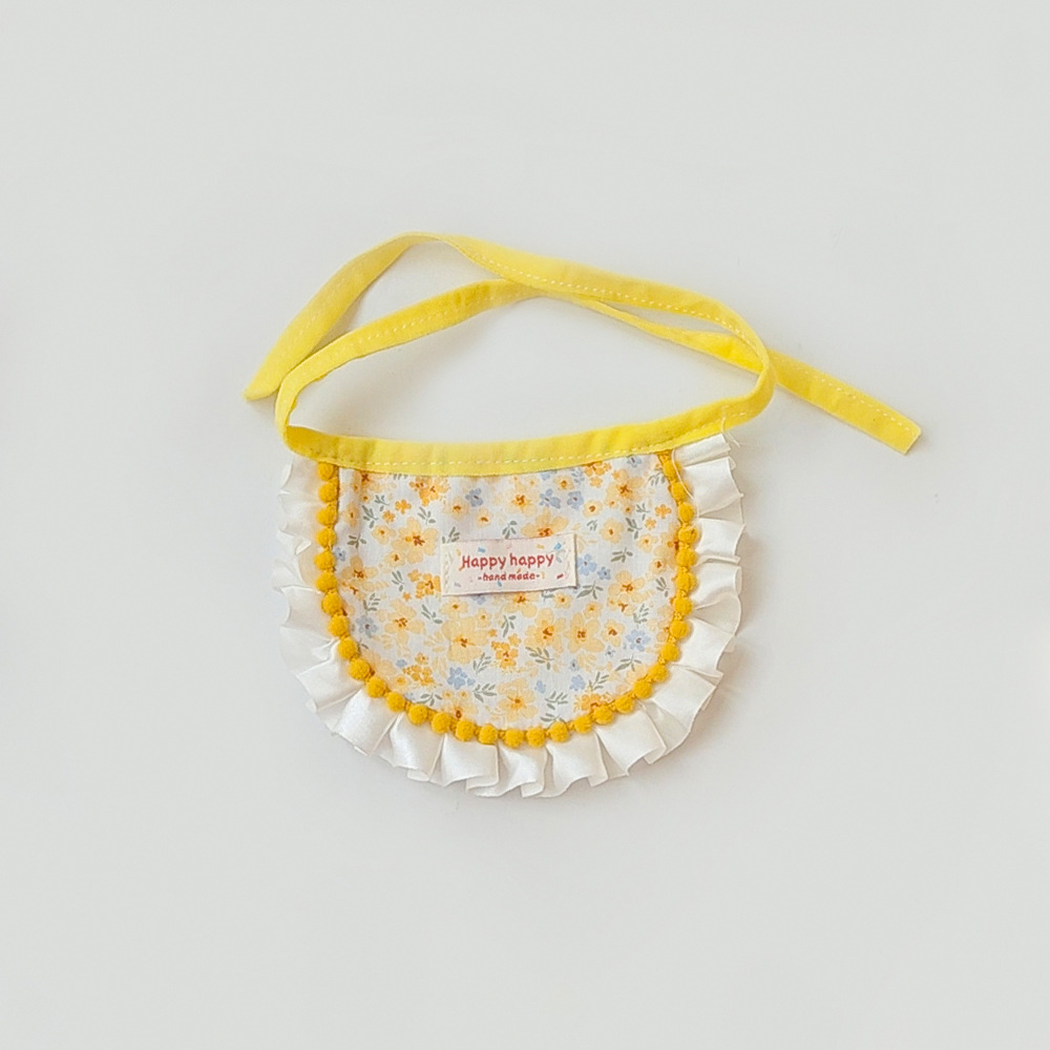 Canola Seed pet neckwear with floral print and pom-pom trim