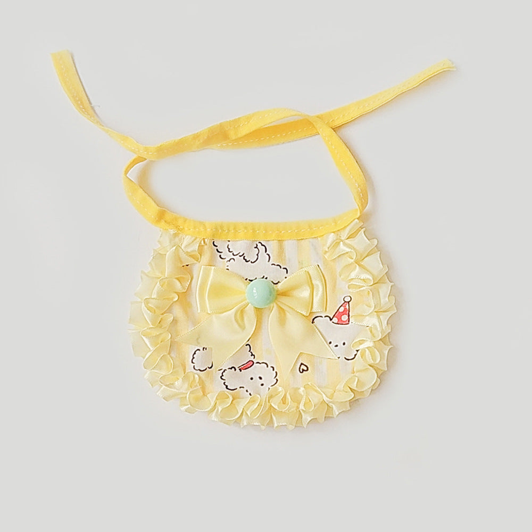 Yellow ruffled pet neckwear with bow and playful dog motif