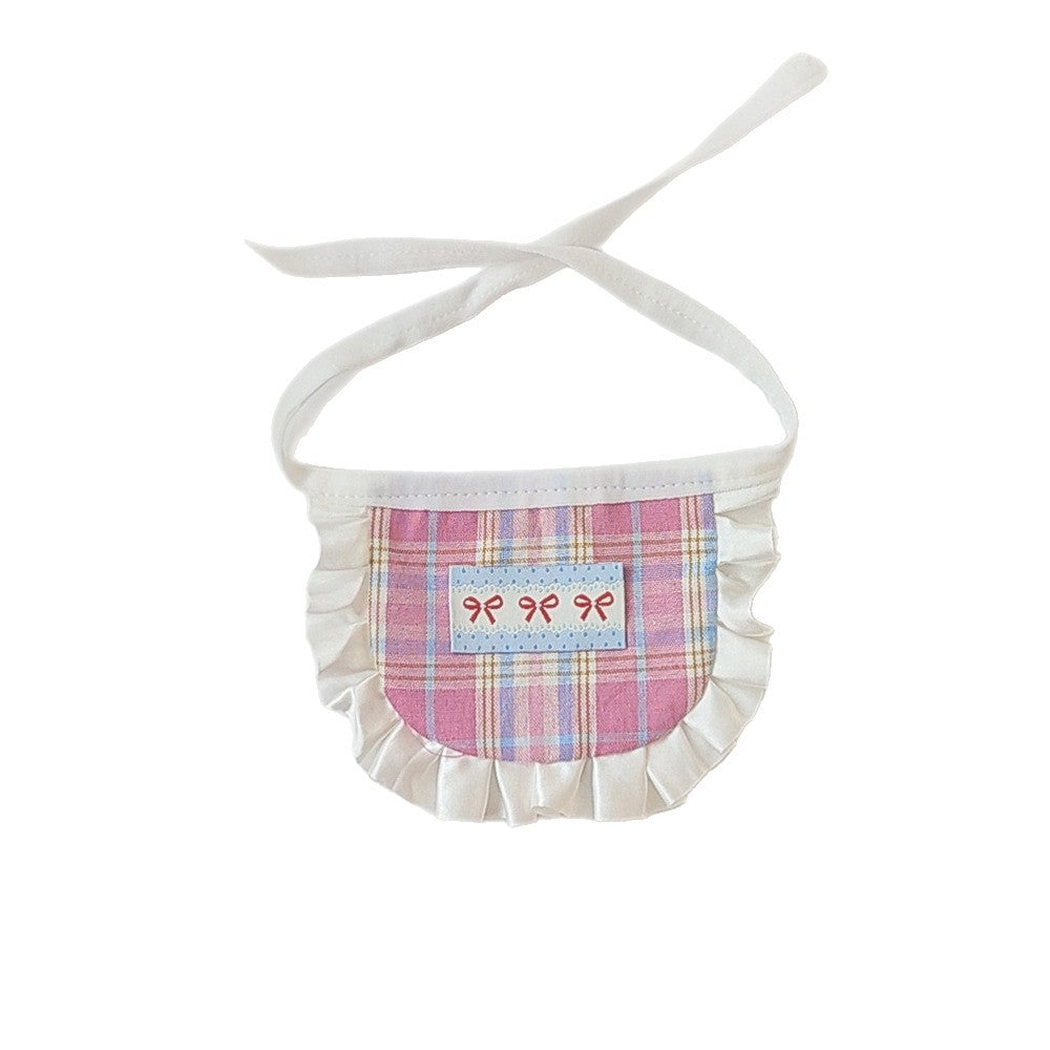 Pink plaid pet neckwear with white ruffled trim and bow motifs