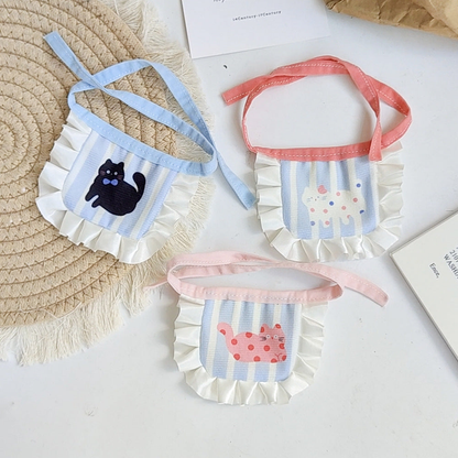 White, Black, and Pink cat-motif pet neckwear displayed together