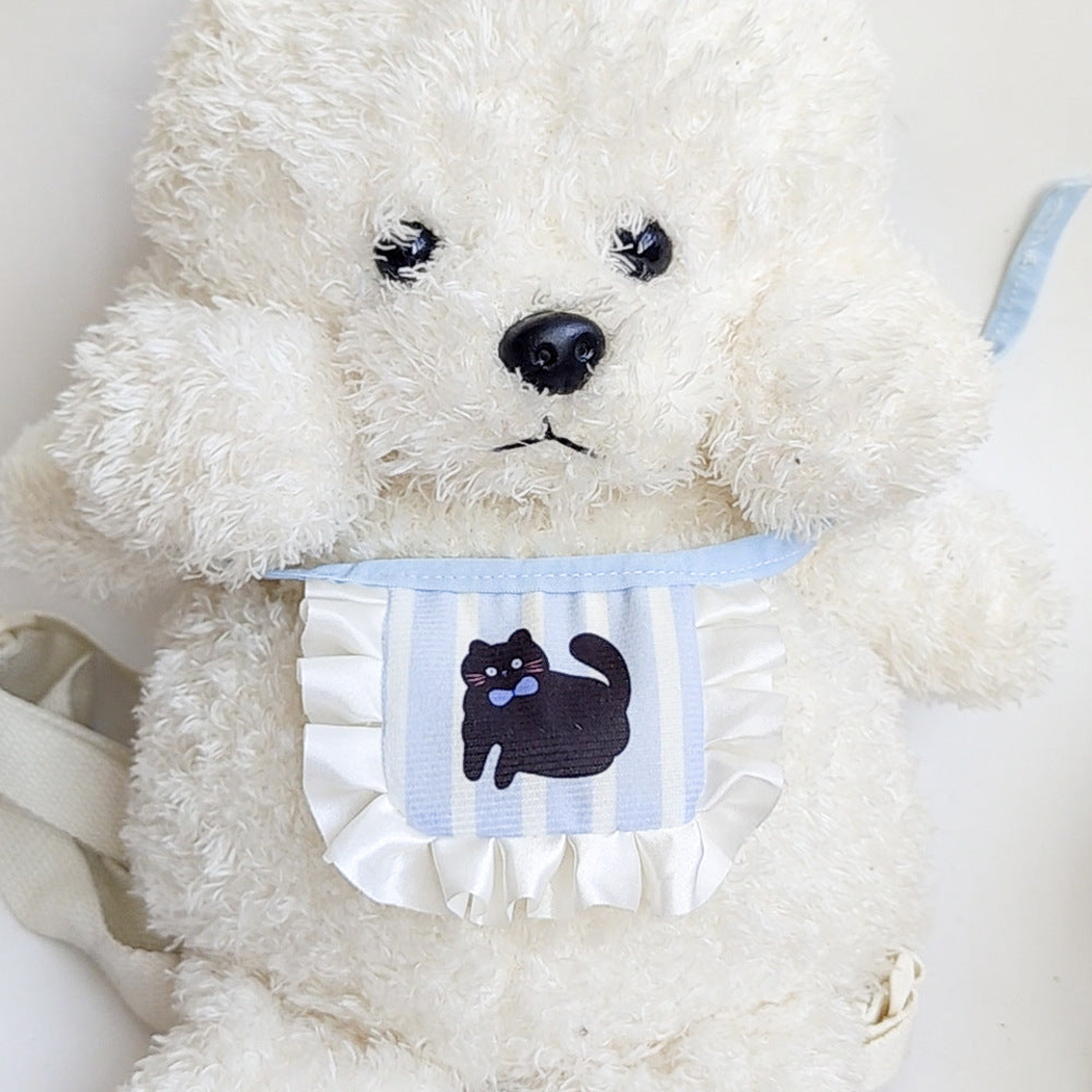 Black cat-motif pet neckwear displayed on a white plush dog