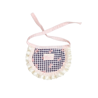 Cream gingham bib-style pet neckwear with bow motifs and ruffled trim