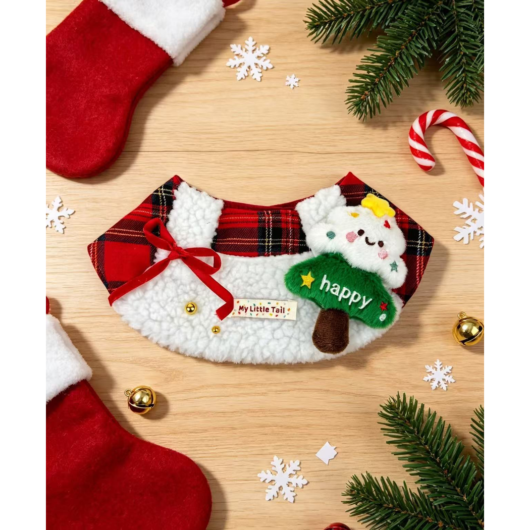 Red plaid decorative pet bib arranged with Christmas stockings, pine branches and bells