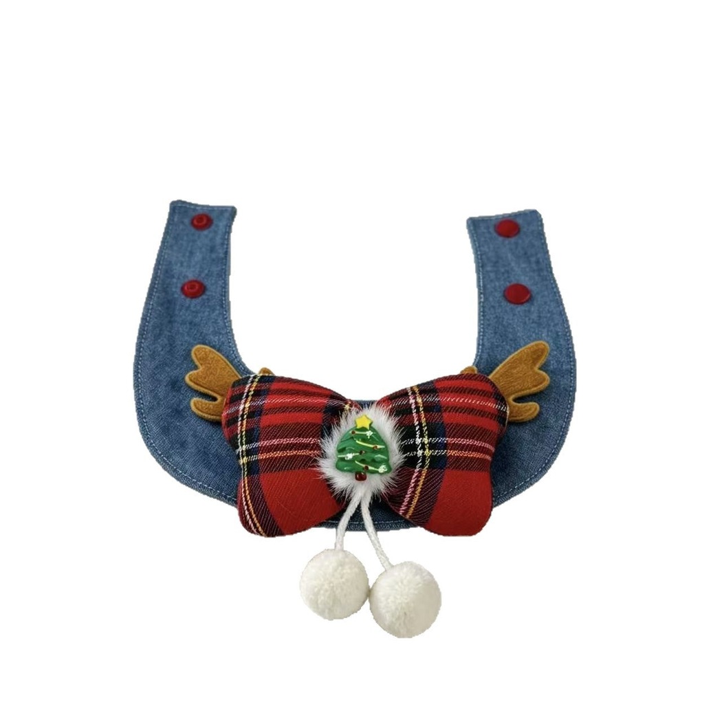 Red tartan bow pet neckwear with antler accents and dangling pom-poms on a white background