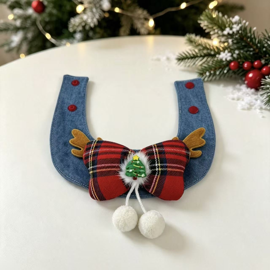 Red tartan bow pet neckwear with antler accents and dangling pom-poms, open view