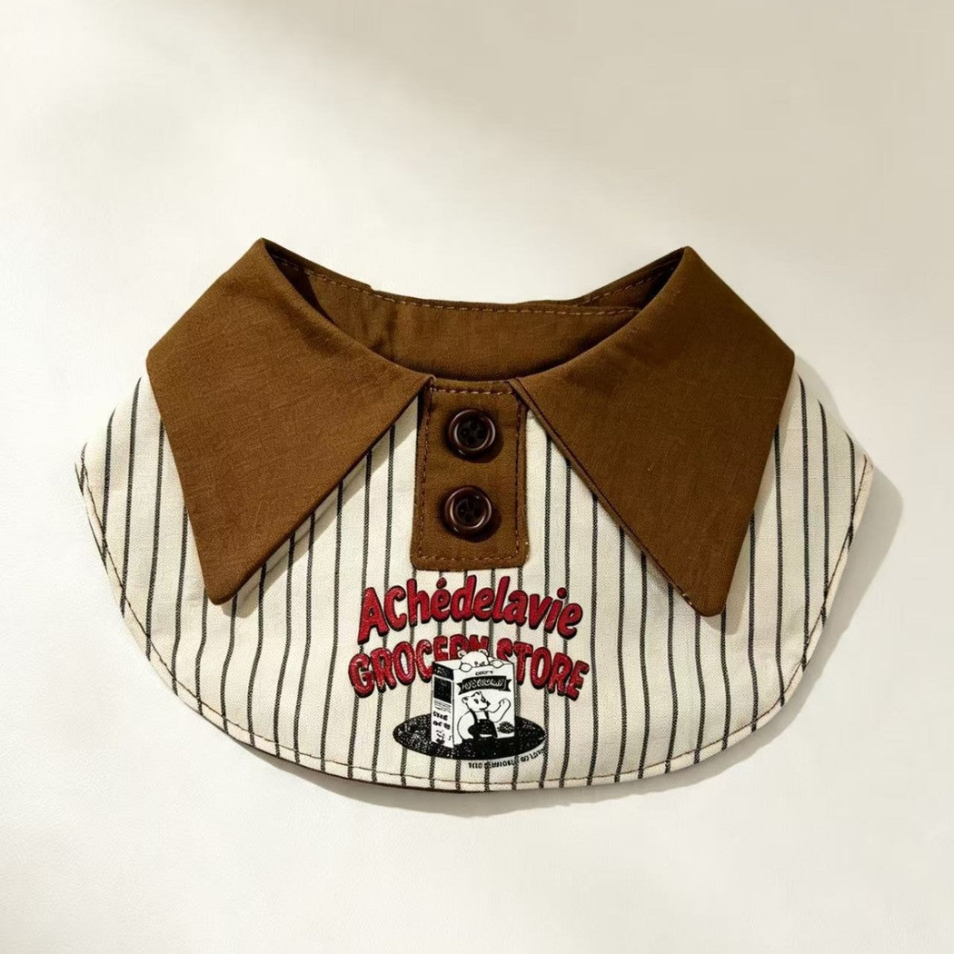 Striped bib-style pet neckwear with brown pointed collar and front graphic