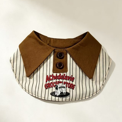 Striped bib-style pet neckwear with brown pointed collar and front graphic