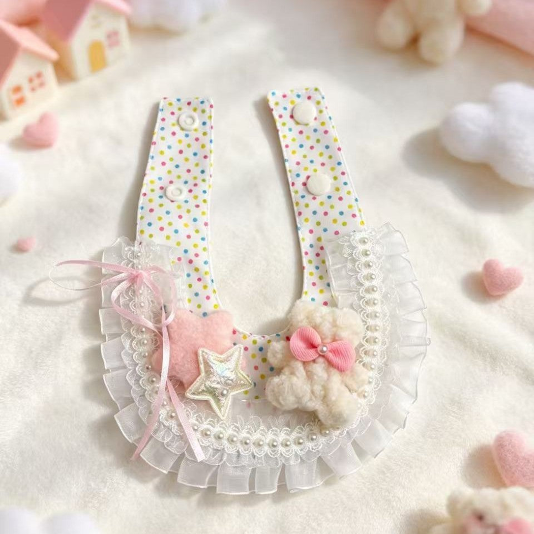 Open neck straps showing two snap positions on each side