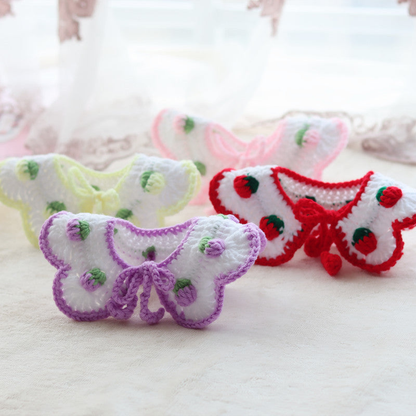 Red, yellow, purple and pink pet neckwear styles displayed together