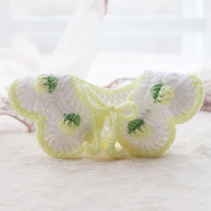 Yellow Bud pet neckwear with scalloped edges, raised bud motifs and tie cords