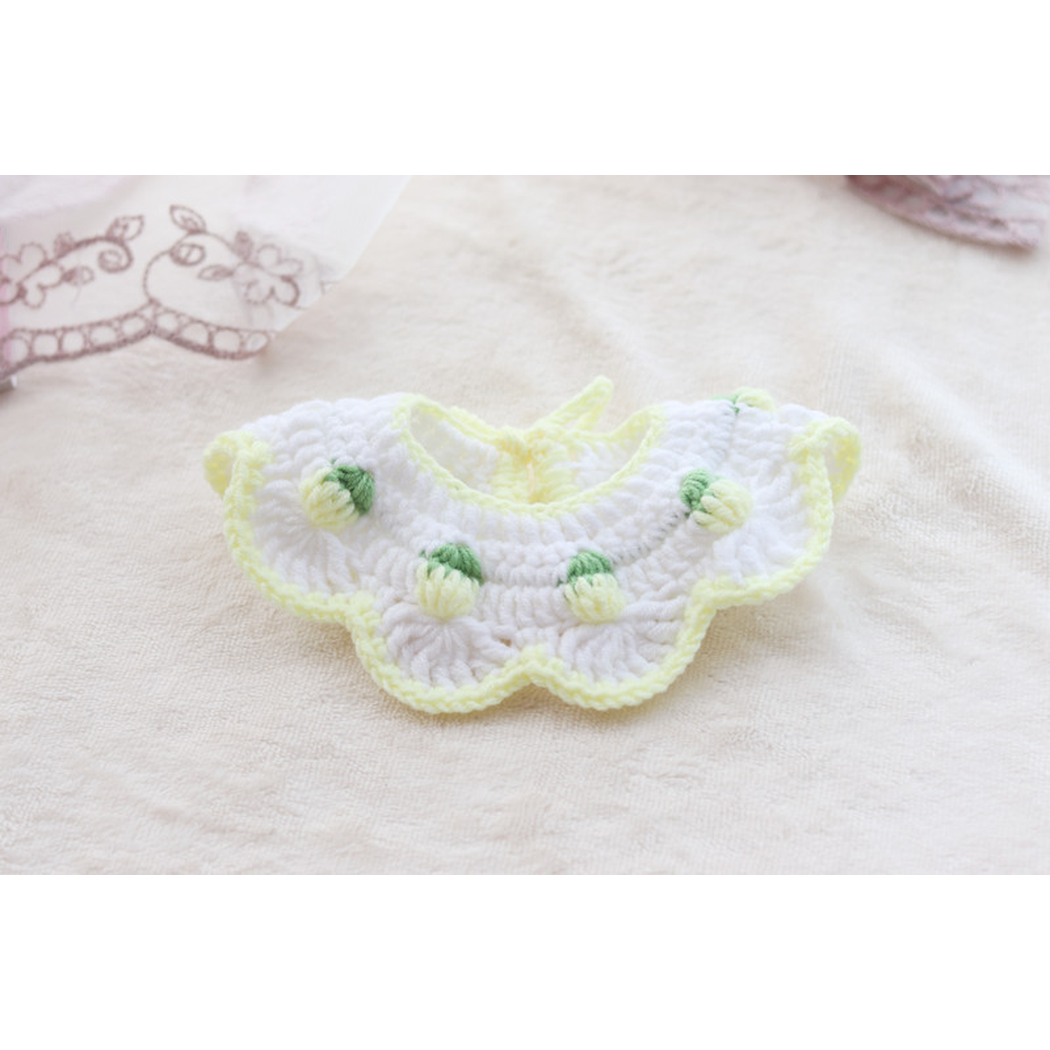 Pink Bud pet neckwear laid open to show the full scalloped shape, neck opening and tie cords